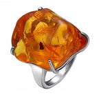 Amber stone silver ring nz