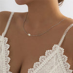 Back necklace with white pearls nz