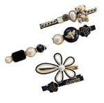 Black and gold hair clip set nz