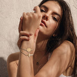 Cross medal bracelet nz