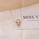 Gold and white cross necklace nz