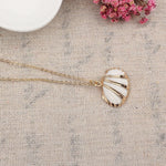Gold and white shell necklace nz