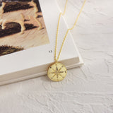 Gold compass pendant nz