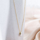 Gold pendant with cultured pearl nz