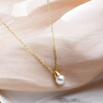 Gold pendant with cultured pearl nz