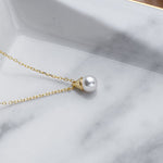 Gold pendant with cultured pearl nz