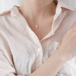 Gold pendant with cultured pearl nz