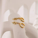 Gold snake earrings with multicoloured diamonds nz