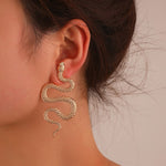 Gold snake shaped earrings nz