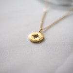 Golden compass pendant nz