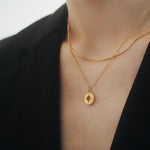 Golden compass pendant nz