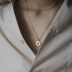 Golden compass pendant nz