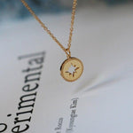 Golden compass pendant nz
