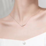 Horizontal cross necklace nz
