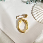 Initial brooch O nz