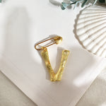 Initial brooch V nz