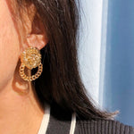Lion symbol earrings nz