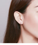 Rounded cross earrings nz