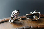 Silver skull earrings nz