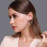 Silver snake feminine earrings nz
