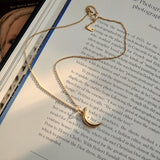 Small gold moon necklace nz