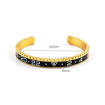 Sports bangle Gold and black / 62 mm nz