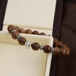 Wooden bracelet with cross nz