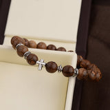 Wooden bracelet with cross nz